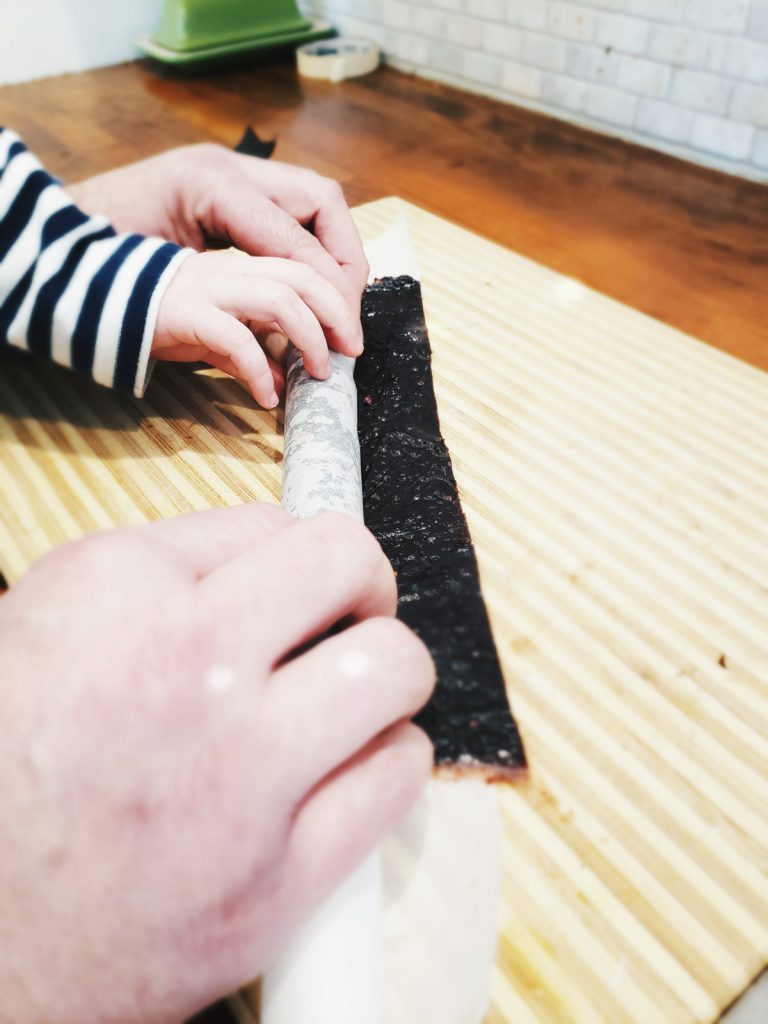 Rolling up our homemade fruit roll-ups